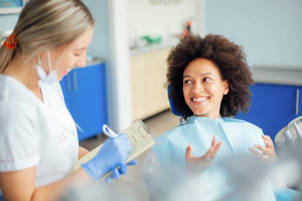 a happy woman at a dental clinic