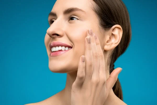 a beautiful woman showing off her smile