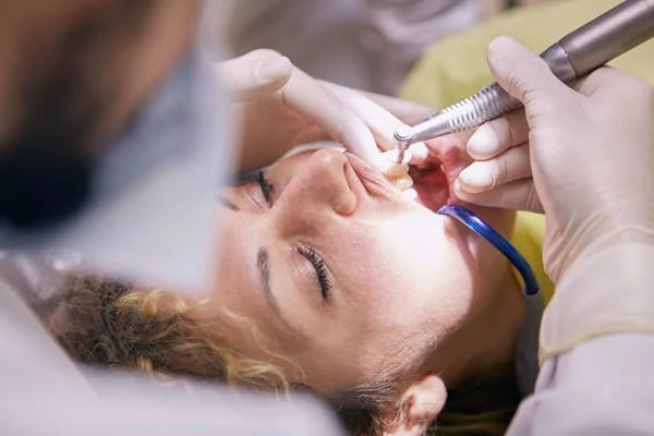 an image of a woman during a dental procedure