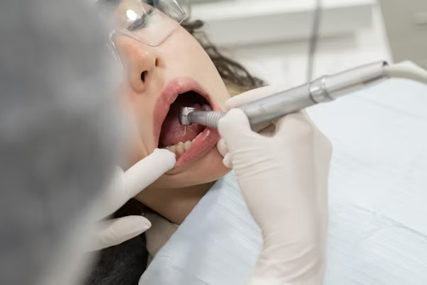 image showing a person during a dental treatment
